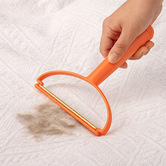 brosse anti poil tapis clair