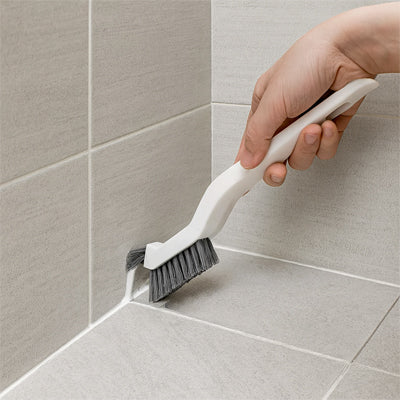 brosse de nettoyage blanche joints carrelage silicone