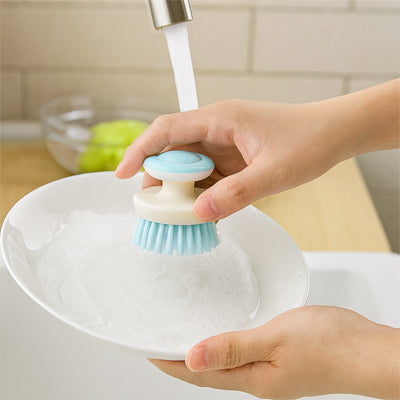 brosse vaisselle bleu clair rincage eau clair entretien