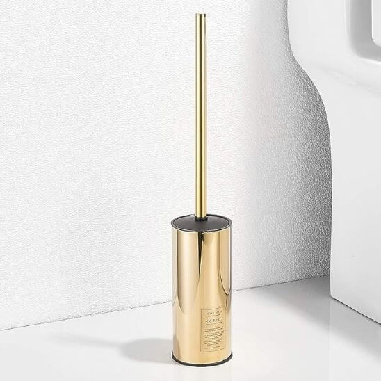 brosse wc dore au sol blanc